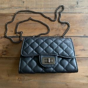 Quilted crossbody purse with chain strap and twist lock